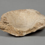 Image of a limestone mortar.