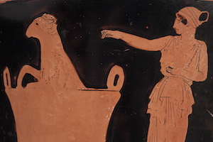 Close up view of Greek vase showing the witch Medea sprinkling magic herbs over an old ram in a pot.